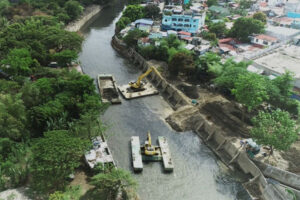 SMC completes Tullahan River cleanup, removes 1.12M tons of wastes  