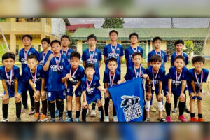 ELEMENTARY CHAMPION. Corpus Christi ‘Little Knights’ proudly display their gold medals after beating Rosevale School 3-1 to capture the gold medal in the Cagayan de Oro City meet Elementary Football event. (Contributed photo)
