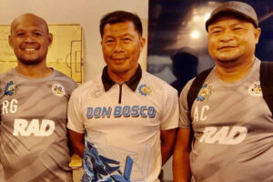 REUNITED. The Spirit of 1996 Go-For-Goal Champion lives one as three members of that champion team Salazar Institute of Technology-Don Bosco Boys Home (SIT-DBBH) Glenn Ramos (center) Rocky Garciano, (left) and Archival Commendador are part of the CVRFA-DBTC coaching staff that has advanced to the semis in the  PFF Men’s National U19 Championship at the Rizal Memorial stadium on June 7. (Contributed photo)