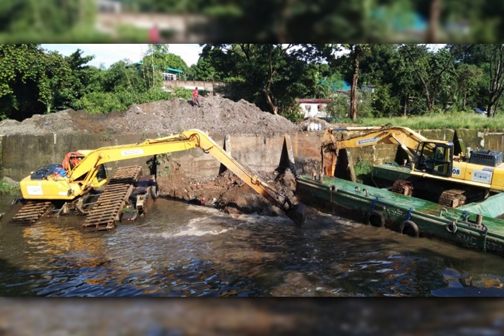 SMC completes Tullahan River cleanup, removes 1.12M tons of wastes