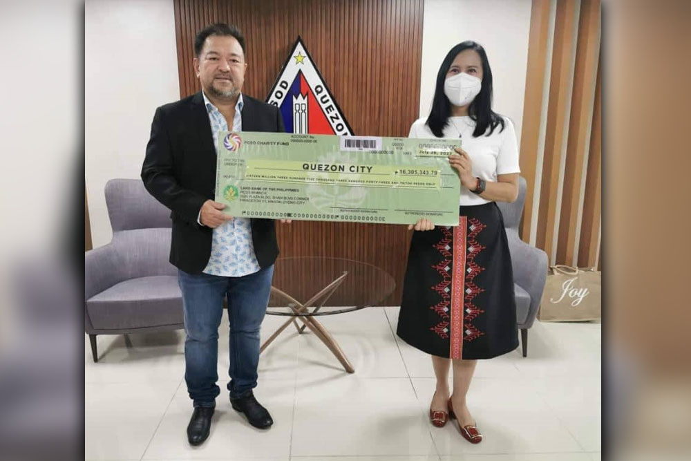 PCSO turns over Php16M Lotto Share to Quezon City