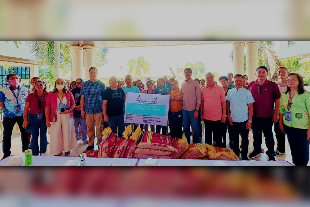 DOLE senior officials witness TUPAD payout worth P3 million to Camiguin beneficiaries