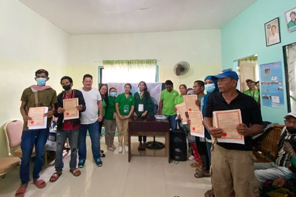 DAR distributes land titles to 296 ARBs in North Cotabato