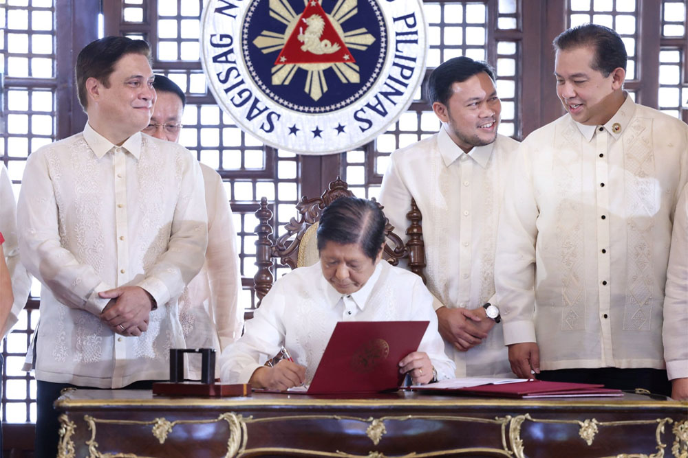 Marcos inks MIF bill into law