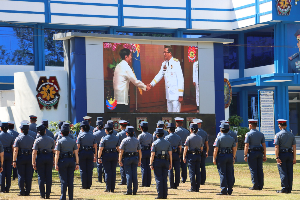 BAGONG PILIPINAS. Personnel at the Police Regional Office in Northern Mindanao stand in formation as a simulcast of the pre-launching event of the 'Bagong Pilipinas' campaign is aired at the Cagayan de Oro headquarters on Wednesday (Jan. 24, 2023). The police and the National Intelligence Coordinating Agency both committed to supporting the Bagong Pilipinas initiative. (Photo courtesy of PRO-10)