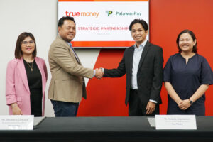 Palawan Group of Companies and TrueMoney MOA Signing . (L-R)_ Lisa Lou Castro-Sabado, Cash Management Solutions Director of Palawan Group_ Third Librea, Business Executive Officer of PalawanPay_ Manuel Cabanero II,