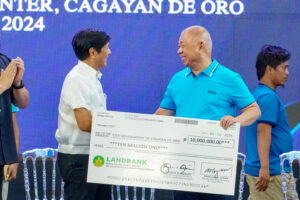 President Ferdinand Marcos Jr. turned over a check to Cagayan de Oro City Mayor Rolando Uy as support for continuous programs and infrastructure projects underway in the city, such as the CDO Coastal Road and CDO Diversion Road, which aim to enhance transportation in Cagayan de Oro City and Northern Mindanao, facilitating easier travel for residents and transporting essential products to markets. (Photo: SAYU/PIA-10)
