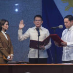 NEW LEADER. Senate President Francis Escudero (center) takes his oath as Senate President before Senator Mark Villar, the youngest in the chamber, during the plenary session on Monday (May 20, 2024). To his right is his wife, actress Heart Evangelista. (PNA photo by Avito C. Dalan)