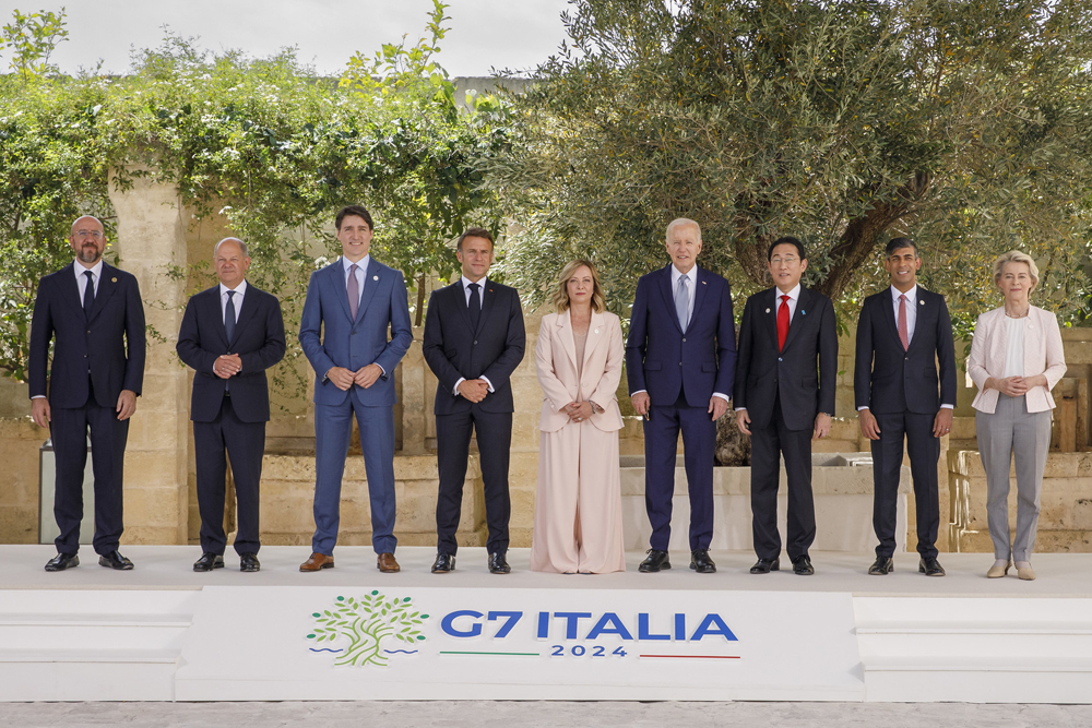 G7 LEADERS. Group of Seven (G7) leaders, (from left) European Council President Charles Michel, Germany's Chancellor Olaf Scholz, Canada's Prime Minister Justin Trudeau, French President Emmanuel Macron, Italian Prime Minister Giorgia Meloni, US President Joe Biden, Japanese Prime Minister Fumio Kishida, British Prime Minister Rishi Sunak, and European Commission President Ursula von der Leyen, pose for a photo on the first day of the G7 summit in Italy on June 13, 2024. On Saturday (June 15, 2024), the leaders called out China for its “increasing use” of dangerous maneuvers and water cannons against Filipino vessels, reiterating the group’s opposition to Chinese “intimidation activities” in the South China Sea. (Photo courtesy of G7)