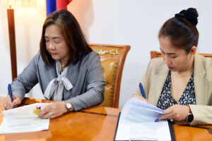 FIRST IT PARK. PEZA said Deputy Director General for Operations Vivian Santos (left) signs a registration agreement with Matutum Holdings Development Corporation President Rochelle Tamayo at PEZA head office on June 19, 2024. This made the Tupi IT Park, the first IT park in South Cotabato, a PEZA-registered zone. (Courtesy of PEZA)